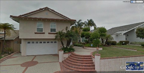 Sierra Tan Colored Stucco House